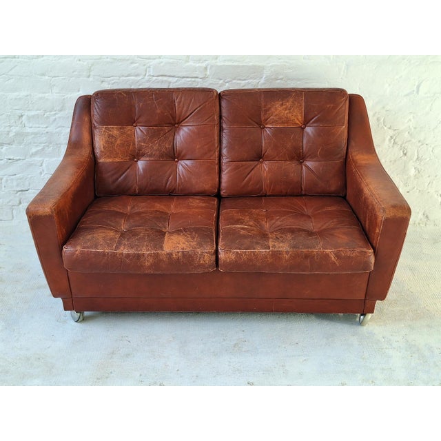 Mid century patchwork tufted 2-seater sofa in warm deep cognac / red-brown leather. Beautifully patinated leather.