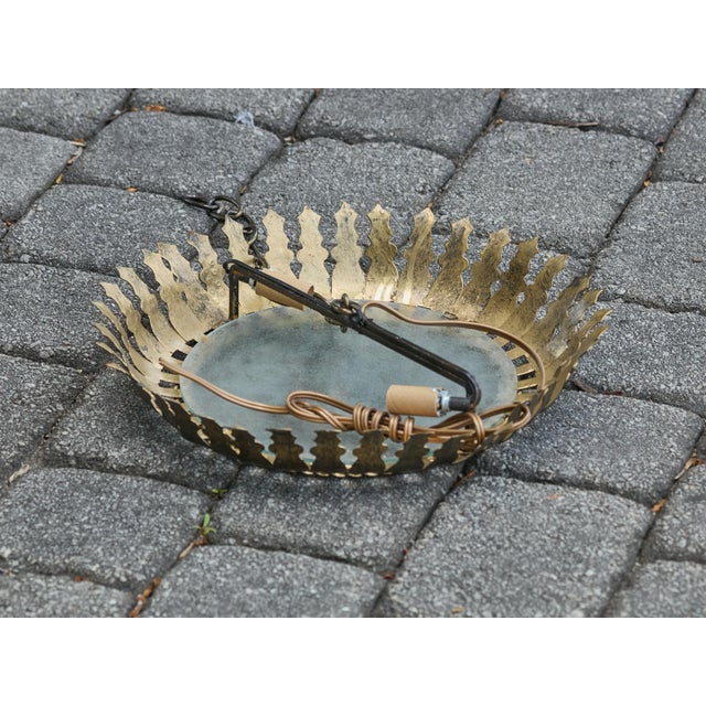 A Spanish vintage gilt metal two-bulb semi-flush crown light fixture from the mid-20th century, with stylized foliage...