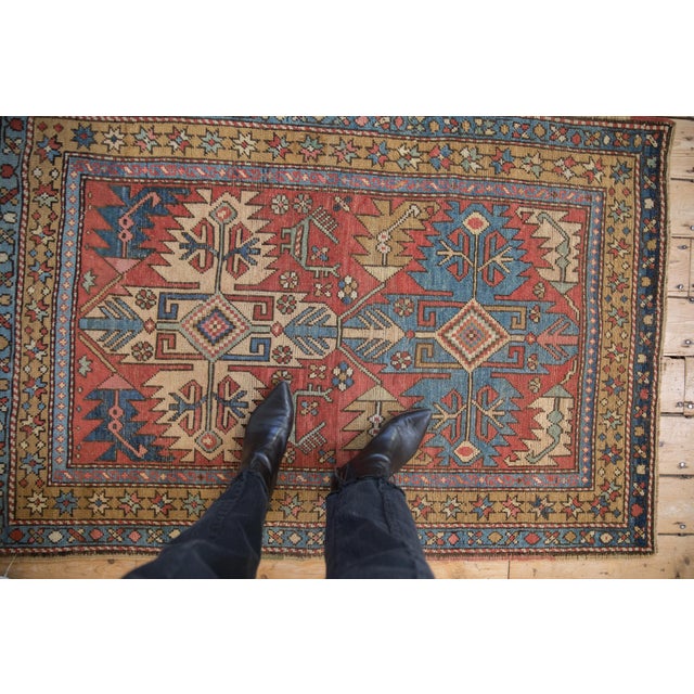 :: Double oversize center medallion with serrated contour surrounded by lightning serrated leaves in partial Herati...