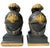 Substantial pair of neoclassical bookends modeled after ancient Greek Corinthian helmets. Finished in matte black with...