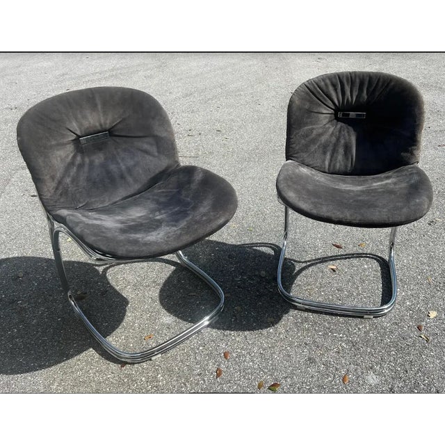 The Sabrina chairs were designed by Rima Rinaldi in Italy circa 1970. The chairs feature chrome tubular steel frames with...