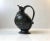 A very early Art Deco styled jug made in Denmark during the 1920s. It is made from Disko Metal an alloy made mainly from...