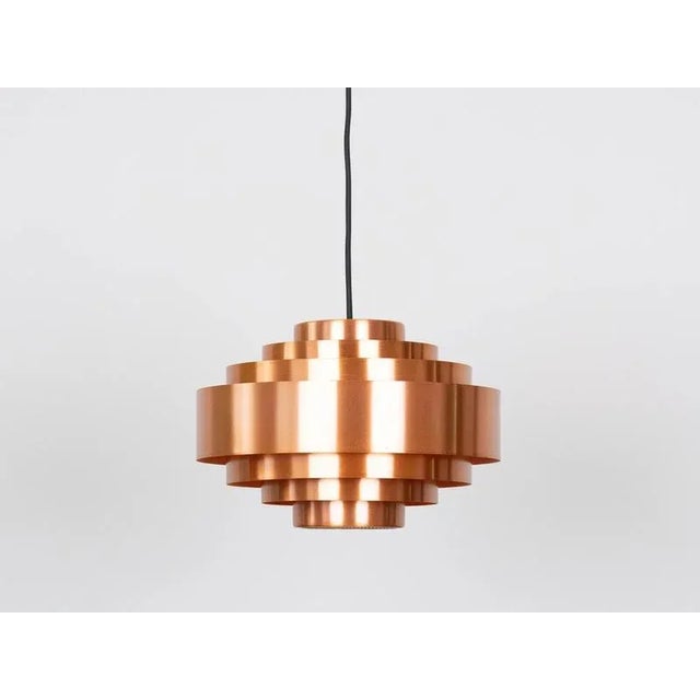 The copper Ultra lamp by Jo Hammerborg, designed in 1963. Excellent quality, solid copper. When lit, the lamp provides a...