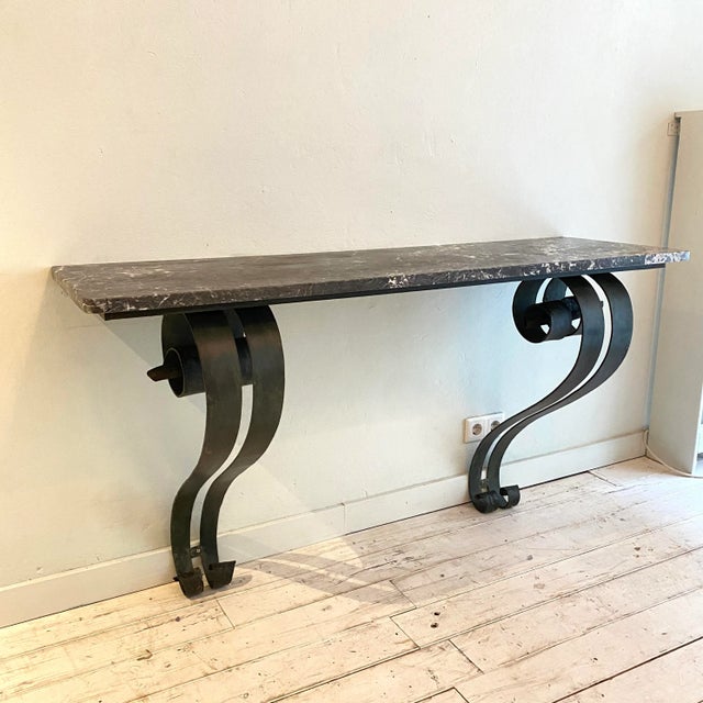 This beautiful Art Deco console table is probably by Raymond Subes and was mad in France around 1925. It is from fantastic...