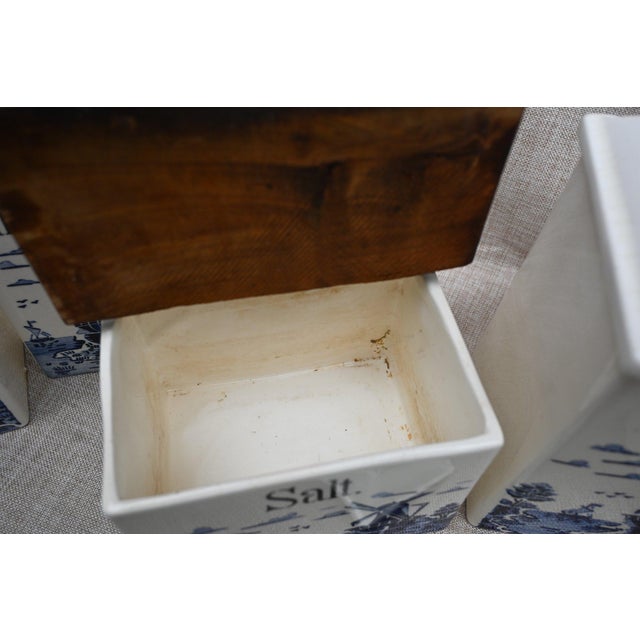 This style of kitchenware is a classic representation of early 20th-century European household goods designed to be both...