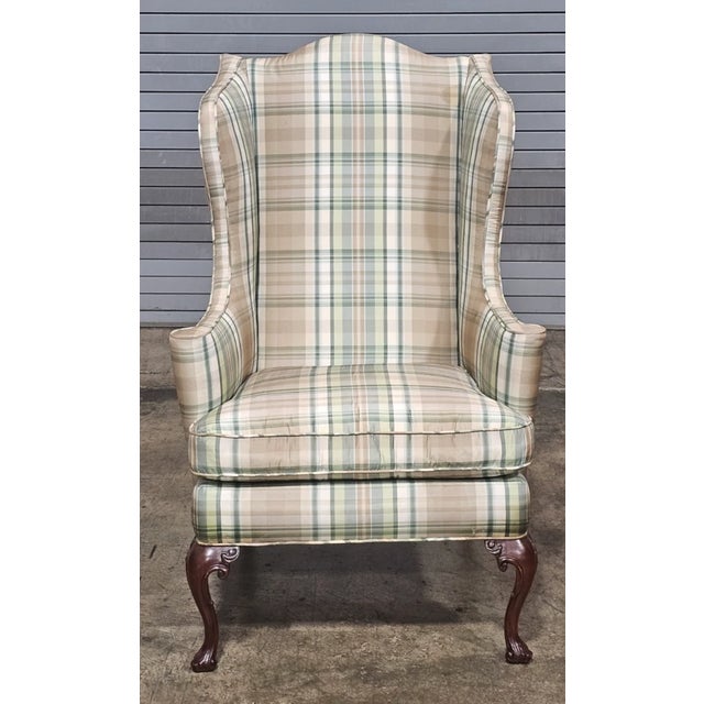 Store Item: Southwood Mahogany Queen Anne Style Wing Chair Plaid Fabric Trifold Feet Description: Chair feature a high...