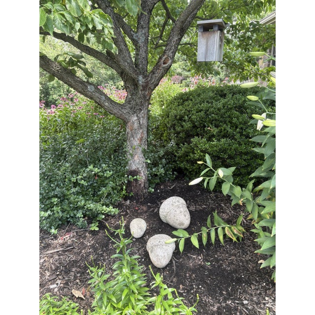 A sculptural trio of cast concrete acorns, each hand-finished with a softly textured surface and natural patina. The forms...