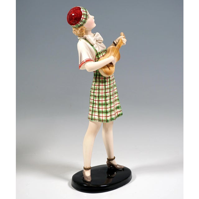 Very rare goldscheider vienna ceramic figurine of the 1930s: standing young lady with blond hair in beige-green-red...