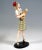 Very rare goldscheider vienna ceramic figurine of the 1930s: standing young lady with blond hair in beige-green-red...