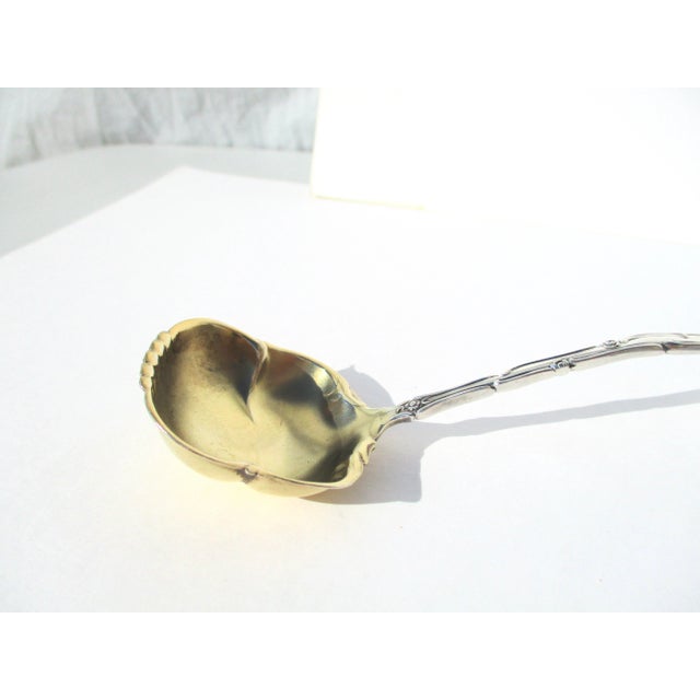 Ladle with a vermeil bowl by Towle Silversmiths. Pattern Old English Pat 1892. The size is 6.2" long and 1.6" wide. the...