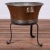 A Swedish copper washtub or planter on wrought iron stand, circa 1890. 19 inches wide 15 ¼ inches deep by 16 ½ inches tall