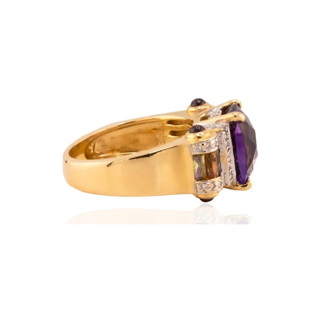 18k Bellarri Ring with approximate 5 carat checkerboar cut amethyst and smaller topaz, citrine and garnets and...