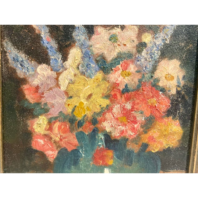 Vintage flower painting. Oil on board measures 8” x 8”. With the original frame, measures 9” x 9”. Signed illegibly lower...
