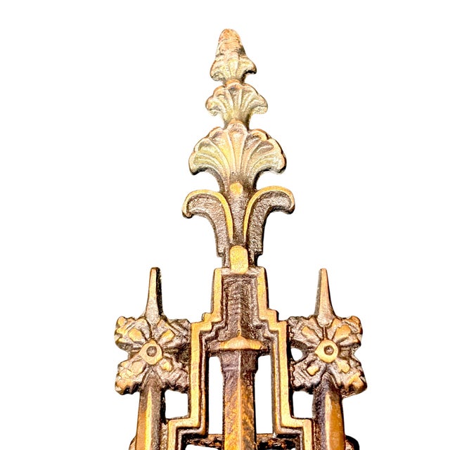 Excellent cast bronze wall sconces with two bulbs each have original finish and new wiring and candle sleeves. The...