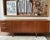 Beautiful vintage mid-century style sideboard by MacIntosh, crafted from warm teak wood. This stylish piece of furniture...