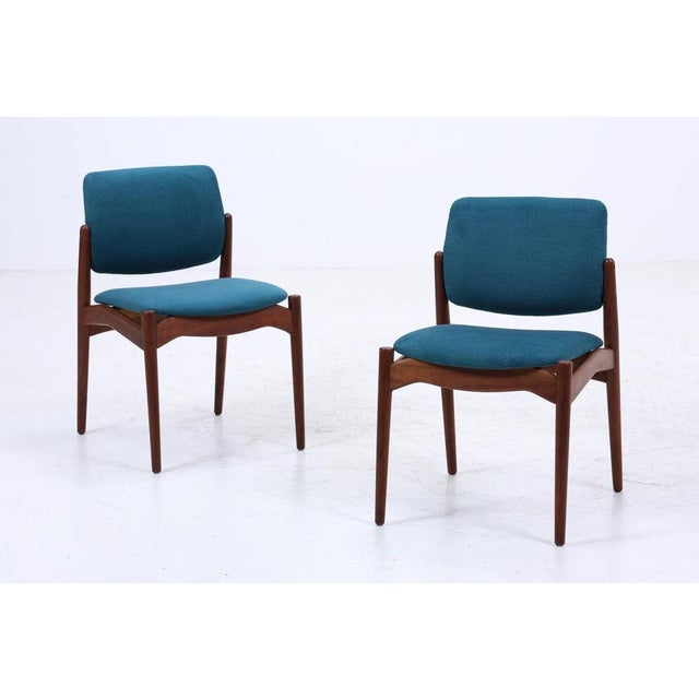 erik buch – model 66 “captain” vintage teak chairs newly upholstered & padded features • set of 2 dining chairs • design...