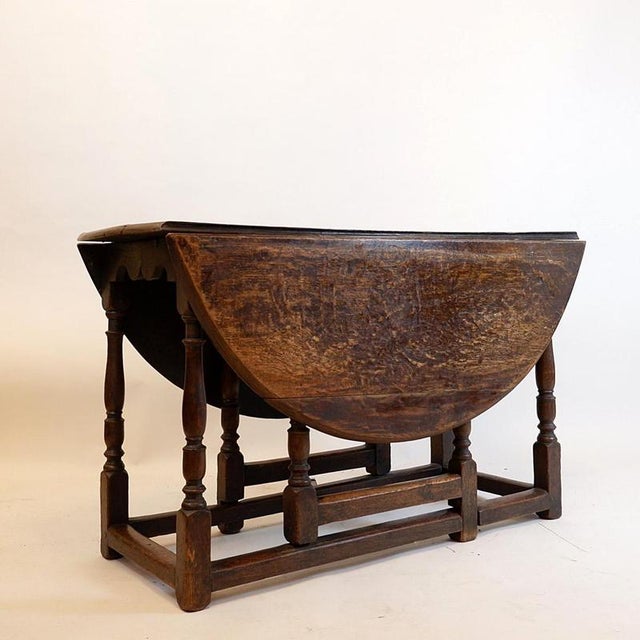 19th Century English Gate-Leg Table with Flaps and Turned Legs Wear Consistent with age and use Measures :...