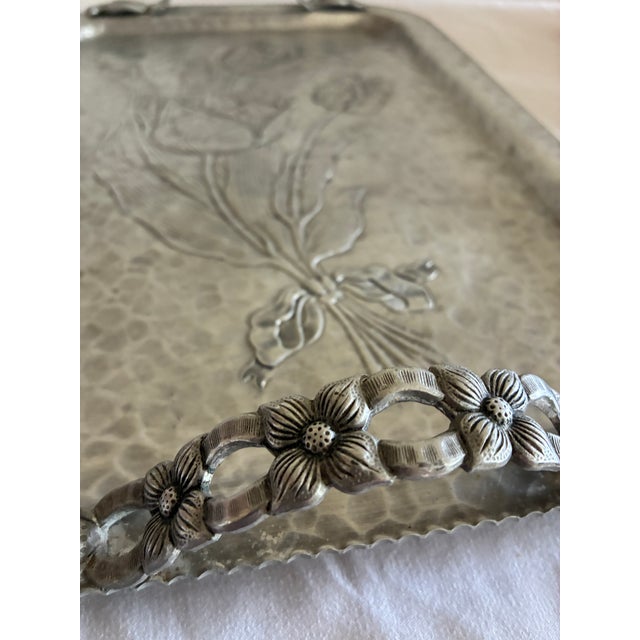 A handsome vintage finds serving piece from Rodney Kent Silver Co., known for their hand wrought hammered aluminum wares...