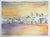 Late 20th century watercolor on paper surreal painting of coastal town at sunset. Unsigned. Unframed.