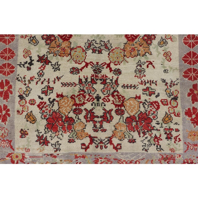 Vintage Turkish Oushak Rug in All-Over Flower Design Background & Simple Boteh Border All-Over Design Turkish Oushak Rug...