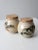 This is a pair of vintage Lakeside Pottery ceramic jars with cork lids. Signed by the artist, the handmade jars have a...