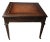 A Mid-20th Century English Regency Mahogany and Tooled Leather Stenciled Side Table on wheels. Its dimensions are...