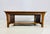 A beautifully crafted Mission-style coffee table by Stickley, dated 1995, constructed in quarter-sawn oak with slatted...
