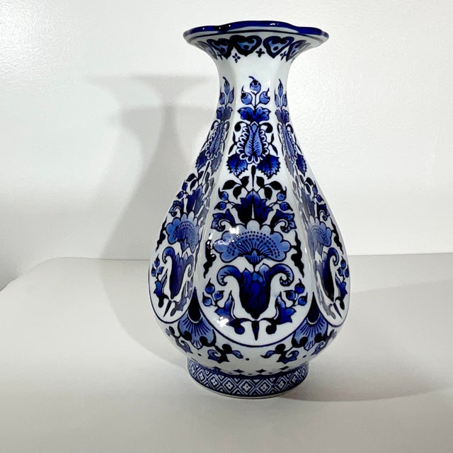 Vintage Home is pleased to present this stunning Six-Sided Blue & White Chinoiserie Vase. The design is gorgeous and...