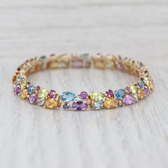 13.09ctw Gemstone Tennis Bracelet 14k Gold 8" Tanzanite Topaz Amethyst Peridot For Sale - Image 4 of 7
