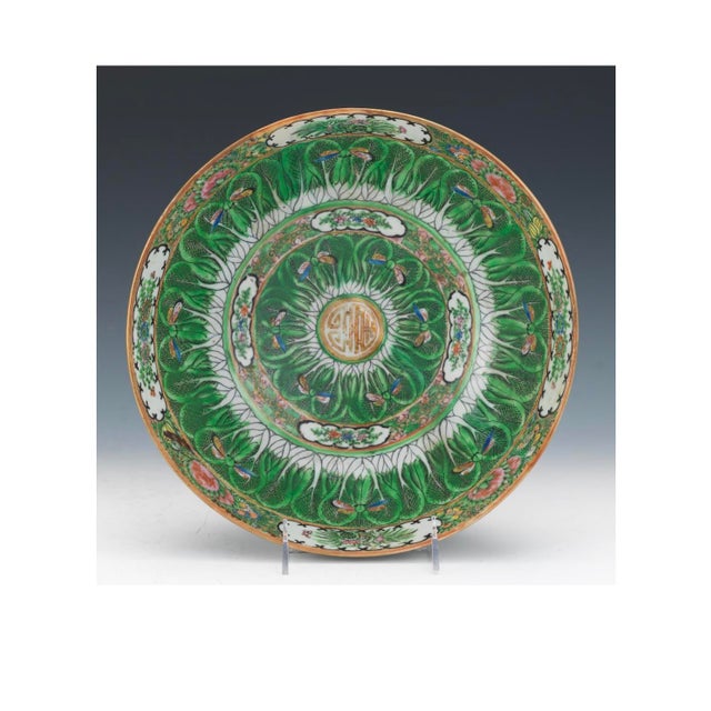 A beautifully executed Chinese famille verse porcelain bowl featuring richly enameled emerald green decoration accented...