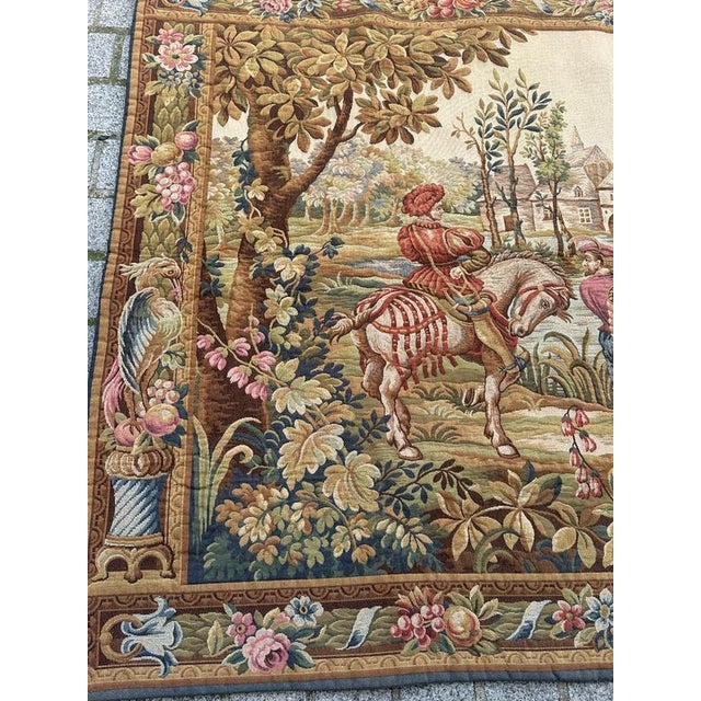 Discover an exquisite vintage French Aubusson-style tapestry featuring a legendary Return from hunting tapestry, Late 16th...