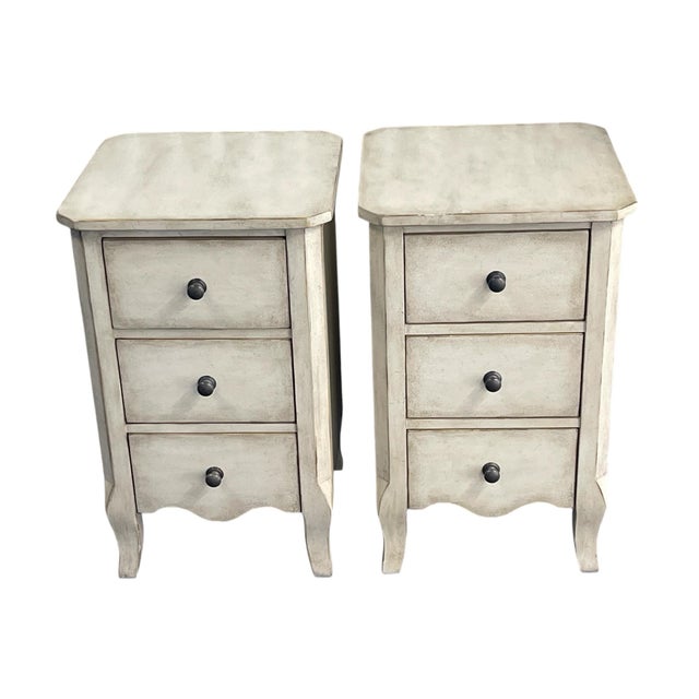 A pair of three drawer nightstands by Lexington Home Brands Lexington plaque inside top drawer of each nightstand Tags and...
