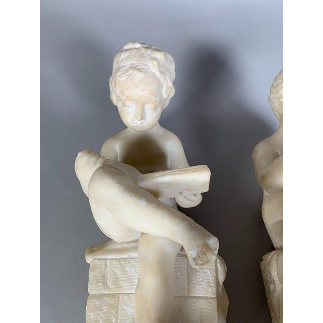 Two 19th Century Marble Sculptures: The Child Scribe and The Reader, After Lemire For Sale - Image 11 of 11
