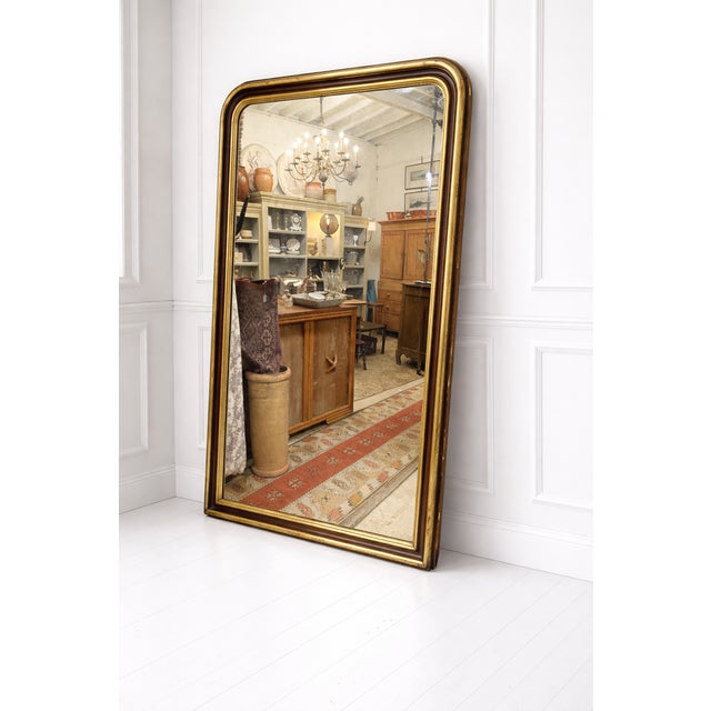Exceptional English in the style of a Louis Philippe mirror, circa 1770, is a true 18th-century treasure. Crafted in...