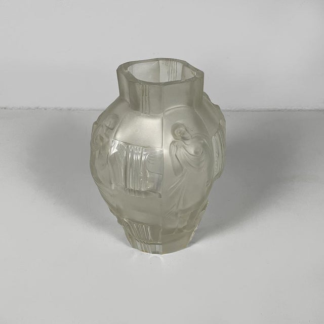 French finely crafted glass vase by Lalique, 1930s Finely crafted glass vase. The neck is square, while the base is...