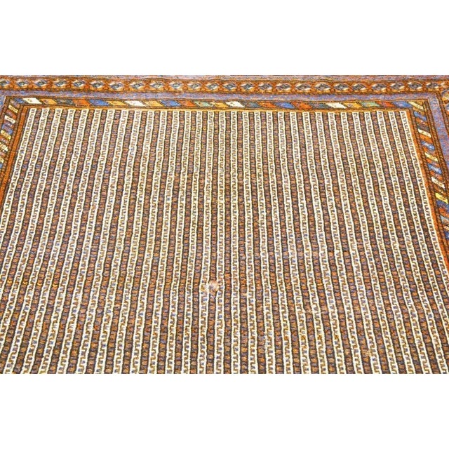 Antique Quasqai hand knotted rug with natural colors, tribal style and soft texture.