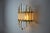 Large Venini wall light dating from the 70s. Cut glass and gilded metal structure. Unique object that will illuminate and...