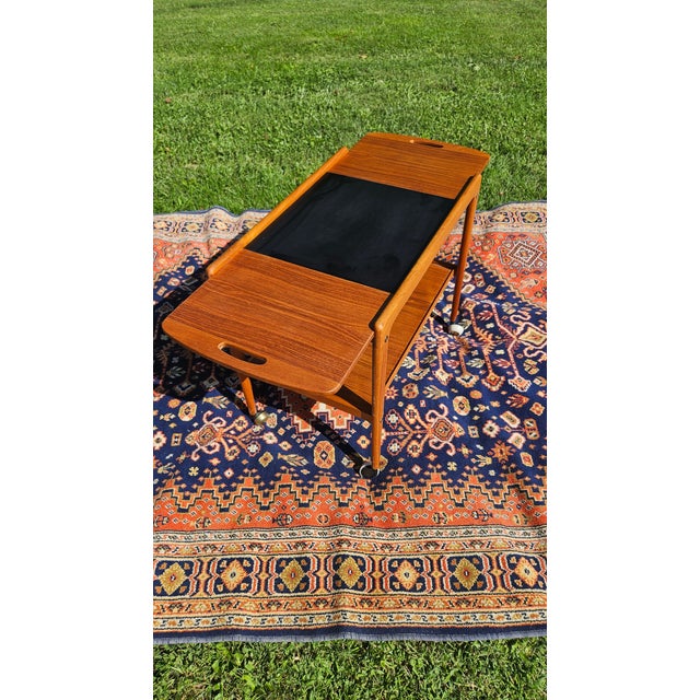 Beautiful authentic Scandinavian modern "Thea" sliding drop-leaf serving trolley / bar cart, attributed to iconic Swedish...