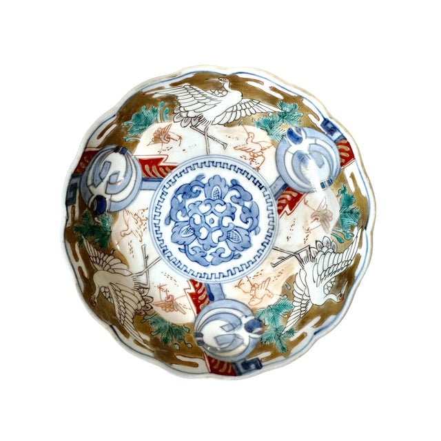 A very good late 19th century Imari bowl from Japan that's decorated at the bottom with a signature.