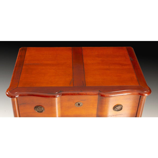 Handcrafted in France, this three-drawer chest features a subtly shaped front and framed top accented in a deeper finish....