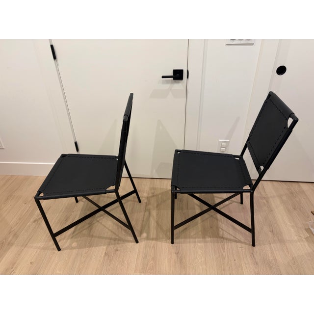 Six (6) Black Laredo Dining Chairs by Crate&Barrel for sale. Purchased in 2021.these chairs are in pretty good condition....