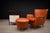 An elegant armchair and ottoman designed by Carlo Hauner in 1950s Brazil—an expression of early Brazilian Modernism where...