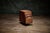 George Nakashima three-drawer pedestal in solid wood, a Mid Century Modern cabinet with integrated carved pulls and a...