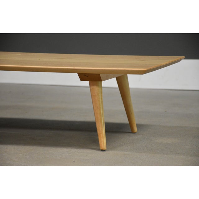 A mid century modern solid maple coffee table or low bench designed by Paul McCobb for Winchendon’s Planner Group....
