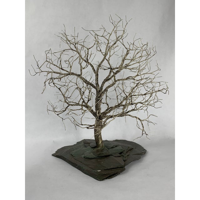 Silver plated tree sculpture on slate base. Signed Adams 1978.