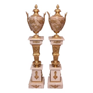 Pair of Large Neoclassical Beige Marble and Ormolu Bronze Urn Amphorae With Matching Pedestals For Sale