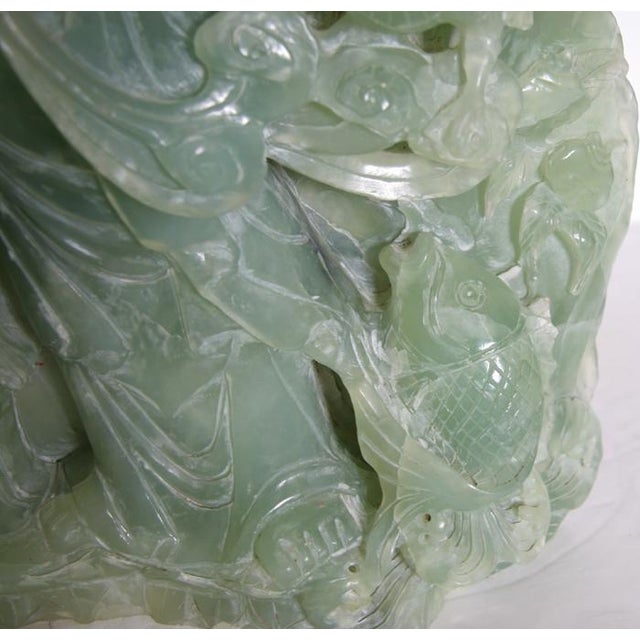 Woman and Two Children Unknown Medium: Jade Sculpture, (Nephrite) Year: Not specified Size: 21 x 10 x 4 in. (53.34 x 25.4...