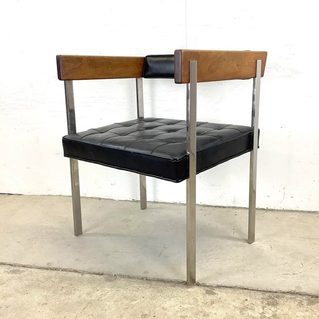 This unique design from the Harvey Probber architectural line is titled Chair 249. The mirrored polish stainless steel...