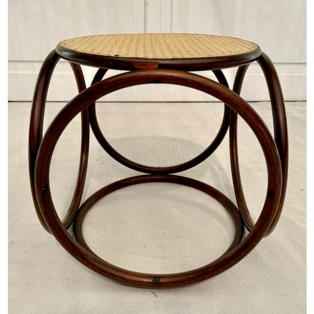 Here is a wonderful piece from the early mid-century attributed to Thonet. The piece is an ottoman, footstool, stool,...