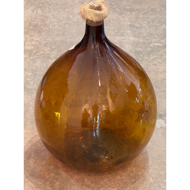 Traditional Amber Glass Demijohn, Labeled Clos Du Roy For Sale - Image 3 of 5